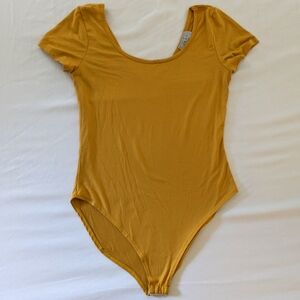 GAZE | Soft yellow bodysuit babydoll style scoop neck v neck back
